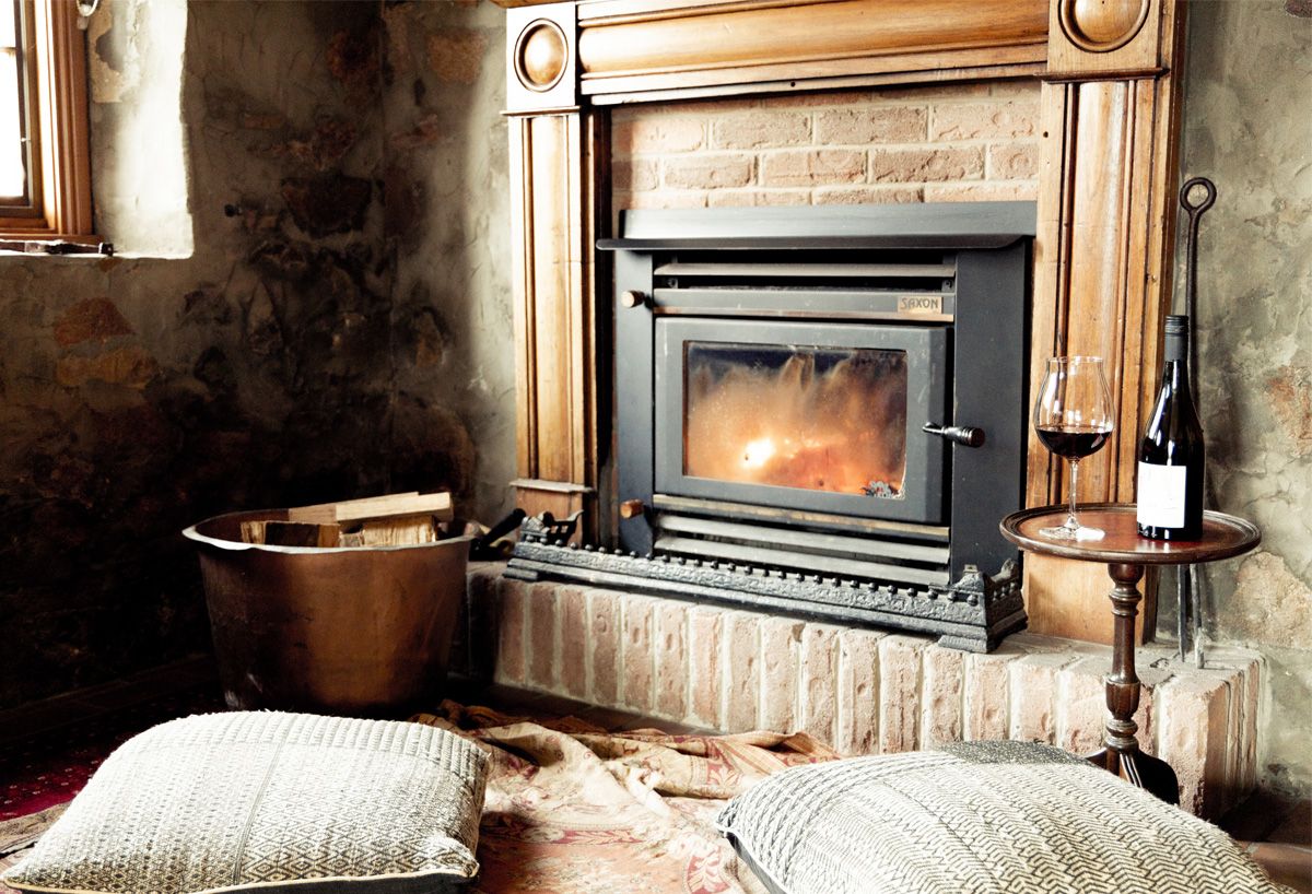 Blacksmith's Cottage fireplace with wine