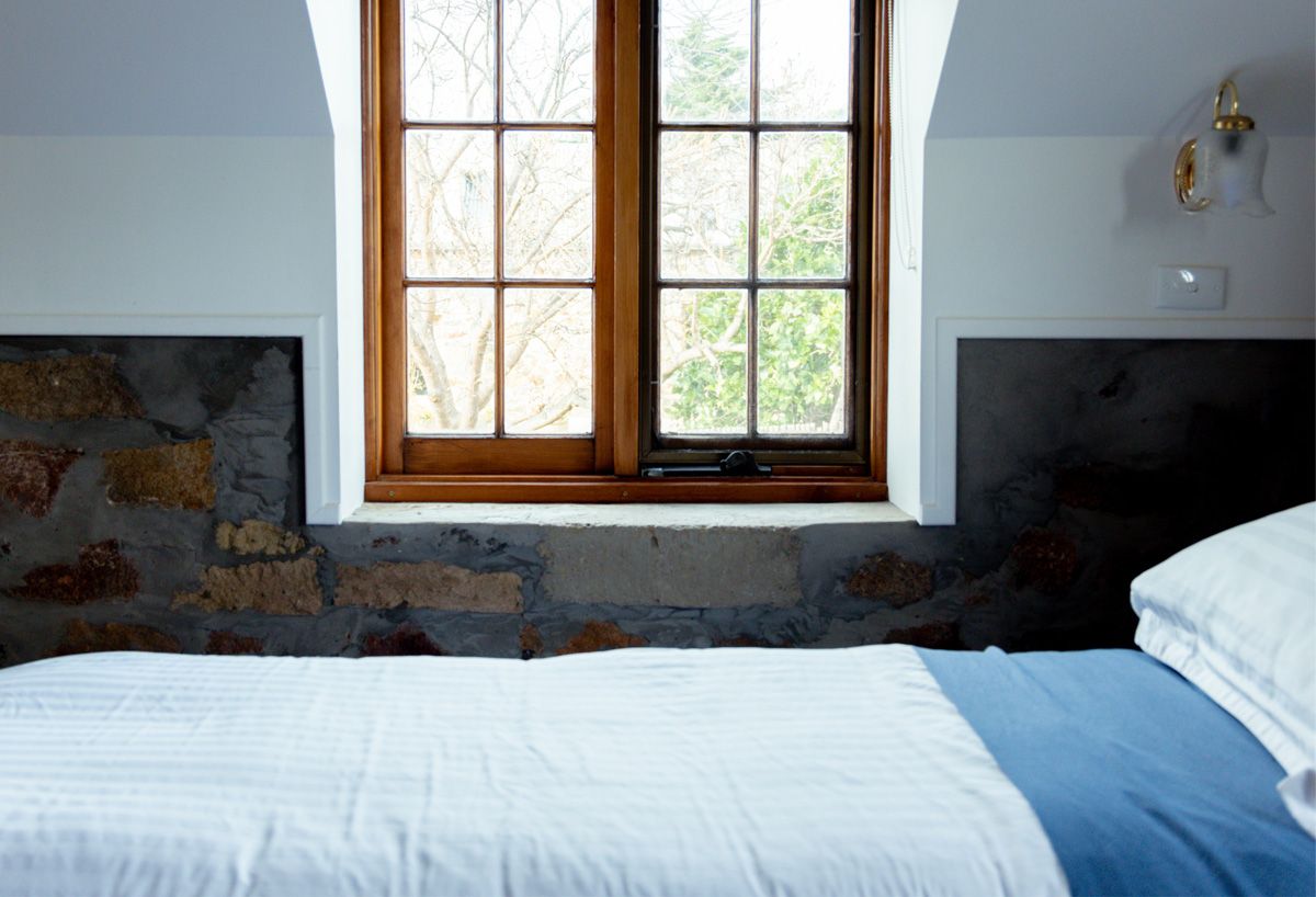 Blacksmith's Cottage bedroom single bed and window view